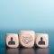 Wooden blocks laid on wooden floor, the concept of cooperation. teamwork Colleagues, friendship, unity, which is the strategy to develop the success of companies and organizations. to new innovation